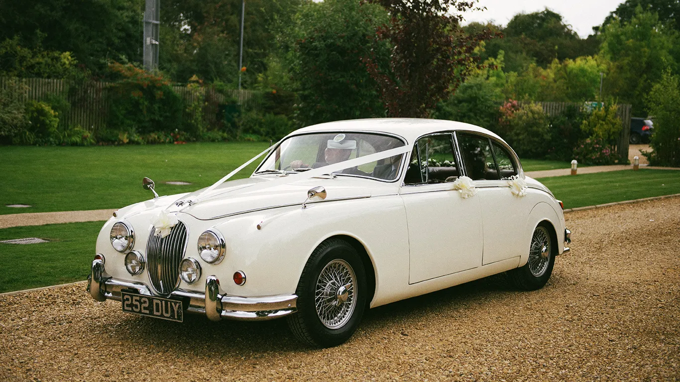 Classic Jaguar Mk2 waiting for Bride and Groom at Reception Venue