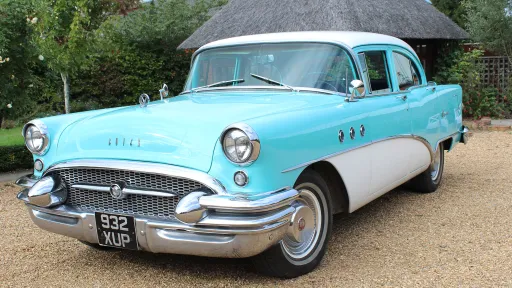 Front Side View Baby Blue Classic American Buick wedding car in Argyll showing large Grill and Chrome Bumper
