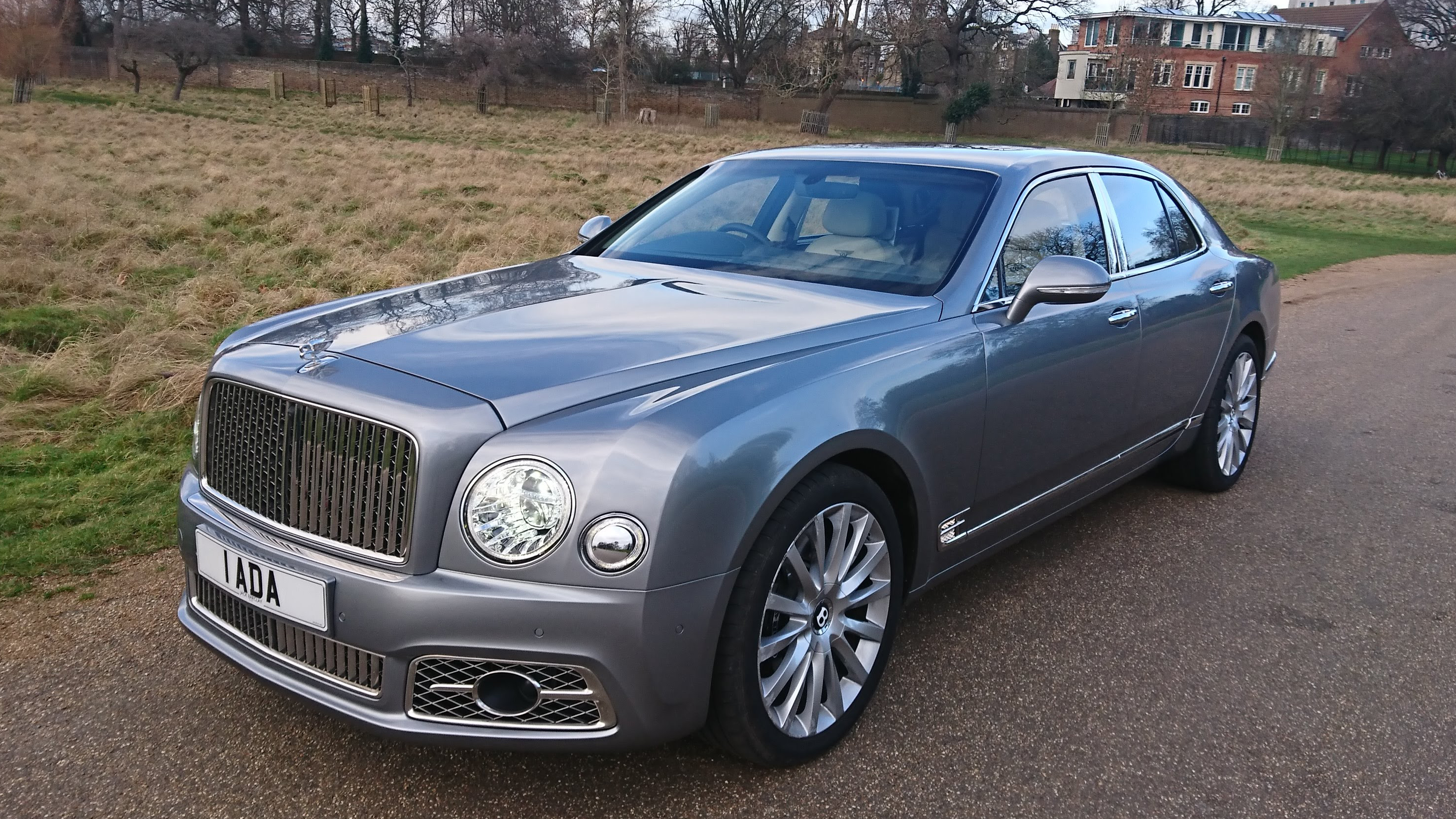 Modern Silver Benltey Mulsanne at a local Walton-on-Thames park in a winter background.