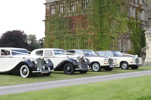 Classic and Vintage Rolls-Royce and Bentley hire in West Yorkshire all decorated with matching ivory ribbons and bows