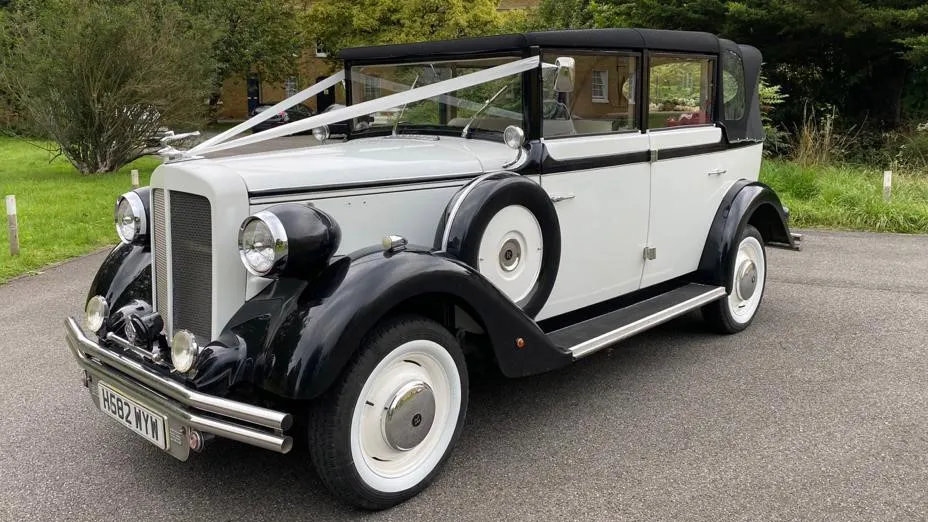 1930's Vintage Style Regent Wedding Car decorated with White Ribbons
