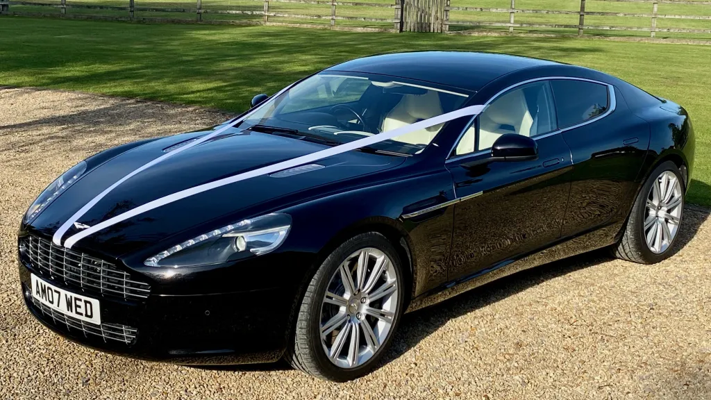 <p>I recently used yourselves to book an Aston Martin Rapide for a wedding car for the groom and myself the best man.</p><p>I would just like to say how impressed I was with yourselves from the booking, paying and right to the day, the driver was scheduled to arrive at 11am and was there bang on time with the correct colour ribbons, he was smart, polite and was brilliant! The groom was over the moon with the car and enjoyed the 20 mins or so of the trip to the venue of his wedding, the driver then had no issues hanging around while the groomsmen all had photos with the vehicle and was on hand to reposition it if needed.</p><p>Again would just like to pass on my huge thanks and the thanks of the groom as well.  Would not hesitate to use you again should the need arise. Many thanks for making the day special.<br>Kind regards,<br>Jason</p>