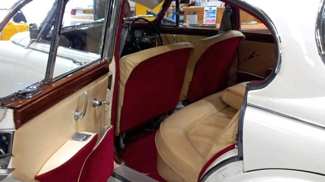 inside of rear seating showing the cream leather interior