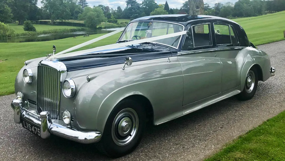 Side View Classic Bentley S2 in Two-Tone Dark Blue over Silver decorated with White ribbons