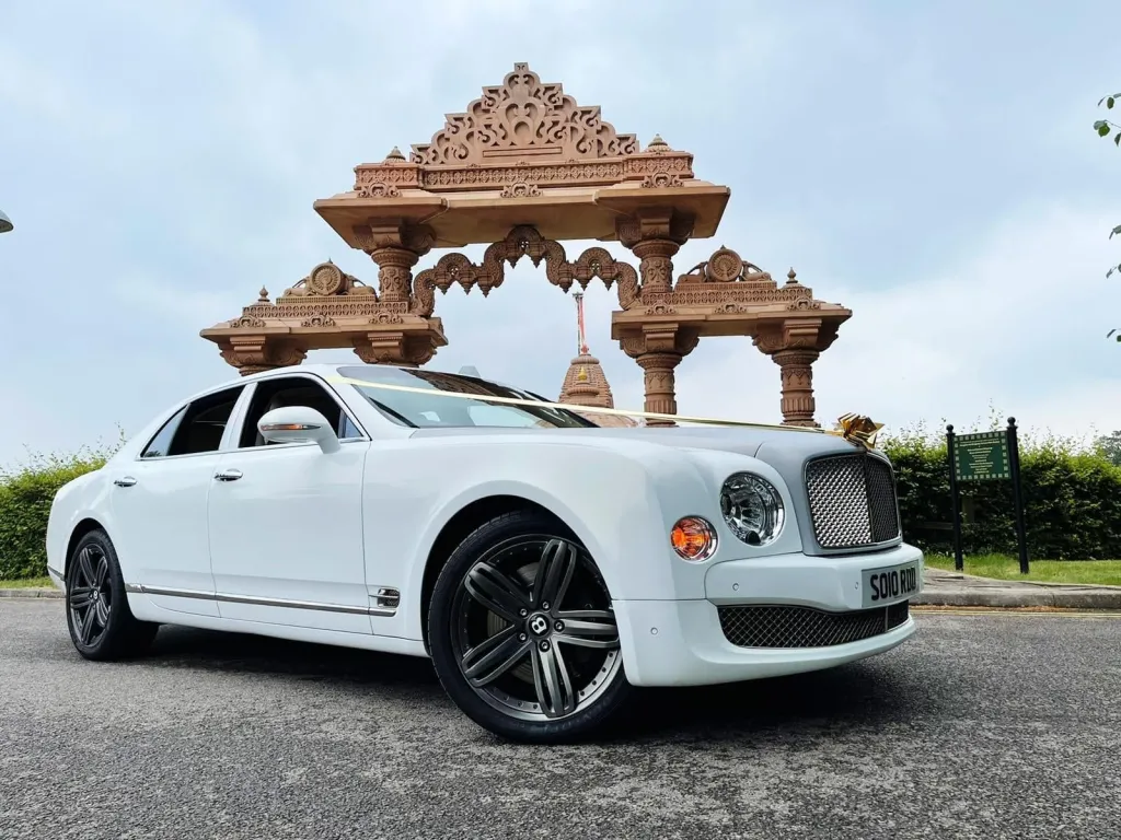 White Bentley Mulsanne in front of Wedding Temple waiting