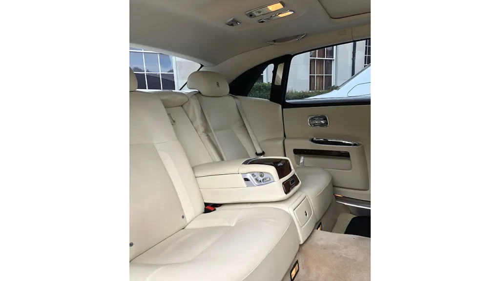 Cream leather nterior of rear Rolls-Royce Ghost