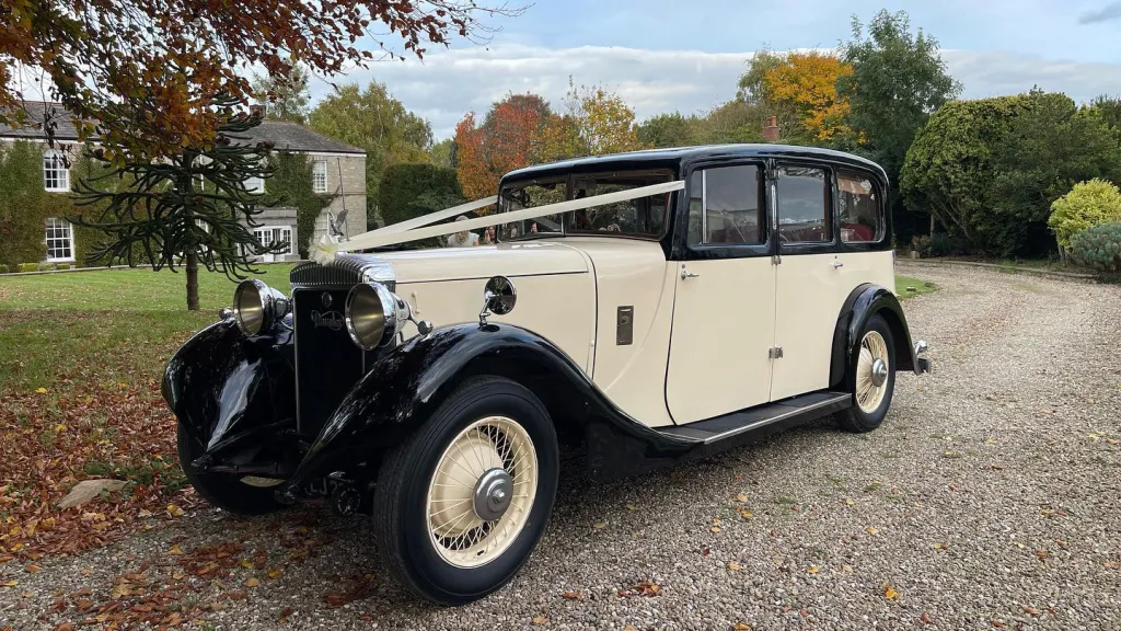 Black & Ivory 1930's Vintage Daimler Limousine with White Ribbons