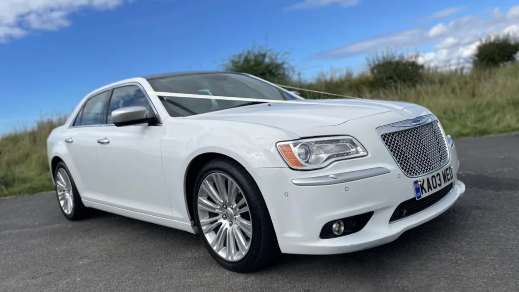 White Chrysler 300c Saloon Car decorated with white ribbon
