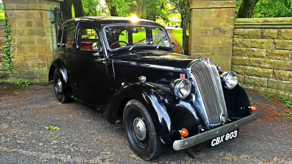 Front side view of Black Classic Standard in front  wedding venue's gate