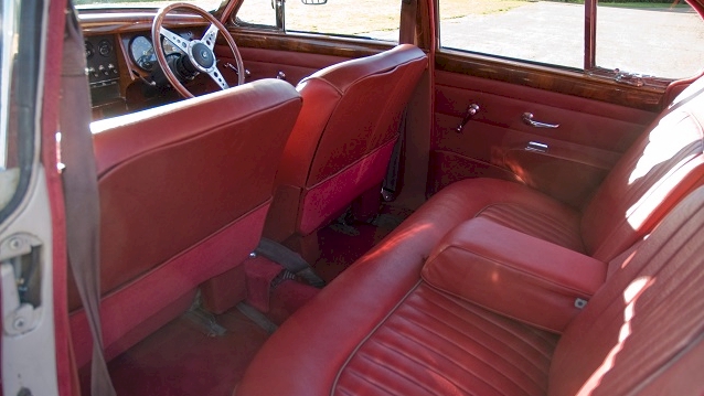 Cherry Red Leather Rear interior of Classic showing the large rear bench seat and ample leg room