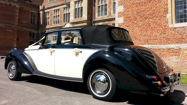 Rear view of Vintage Royale Convertible with Black Soft Top Close