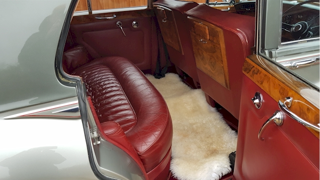 Inside photo of Classic Bentley rear seats showing the Burgundy Leather seats and large legroom
