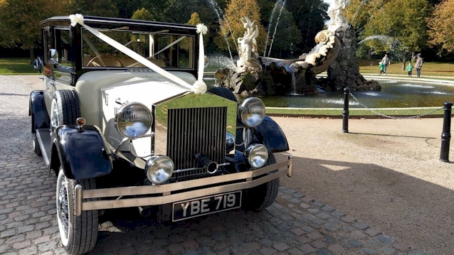 Front view of imperial Viscount car decorated with white ribbons