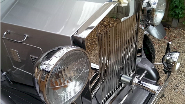 Front view of the large Chrome Grill and large chrome headlights