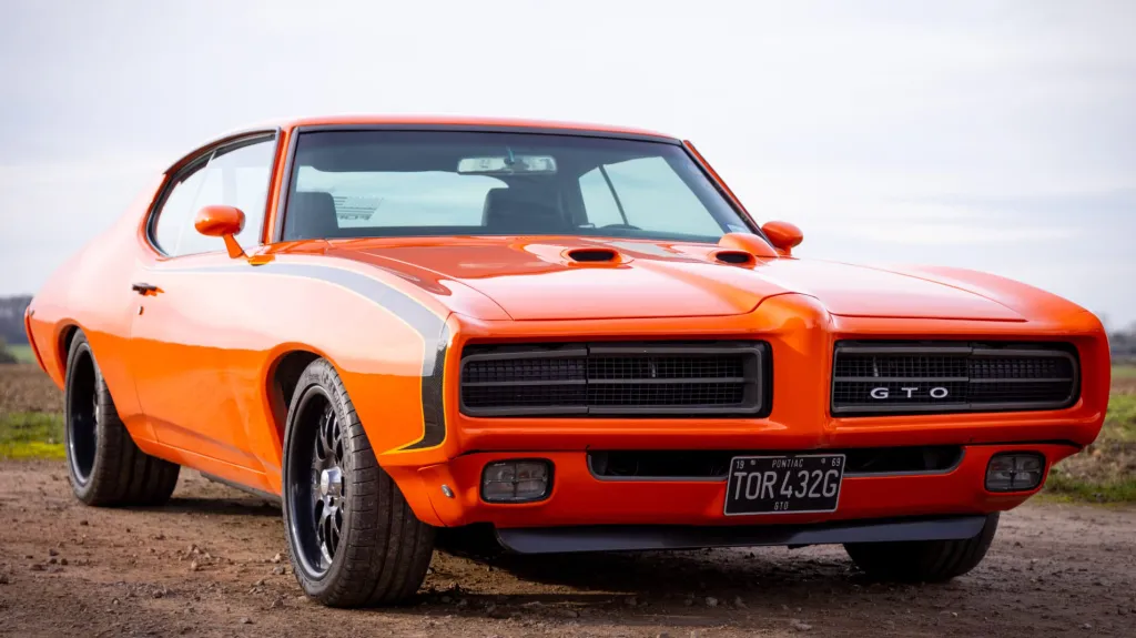 Right Front Side view of Orange Classic American Pontiac GTO