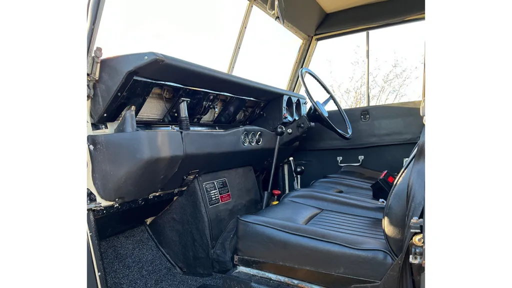 Inside front seat of a Classic Landrover with black interior