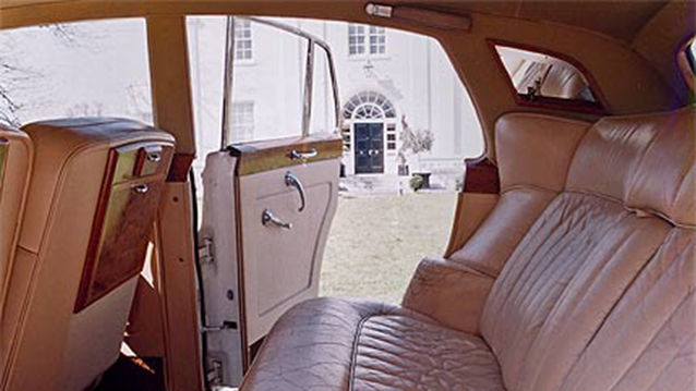 Interior photo of rear cream leather seats of Tan Leather interior
