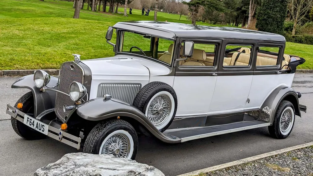 Two-Tone White and Bronze vintage Bramwith Limousine with spare wheel mounted on wheel arch
