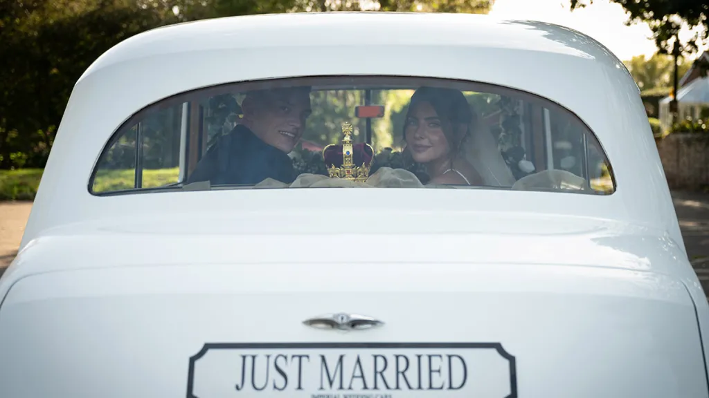 Rear view of Austin Princess with "Just Married" sign