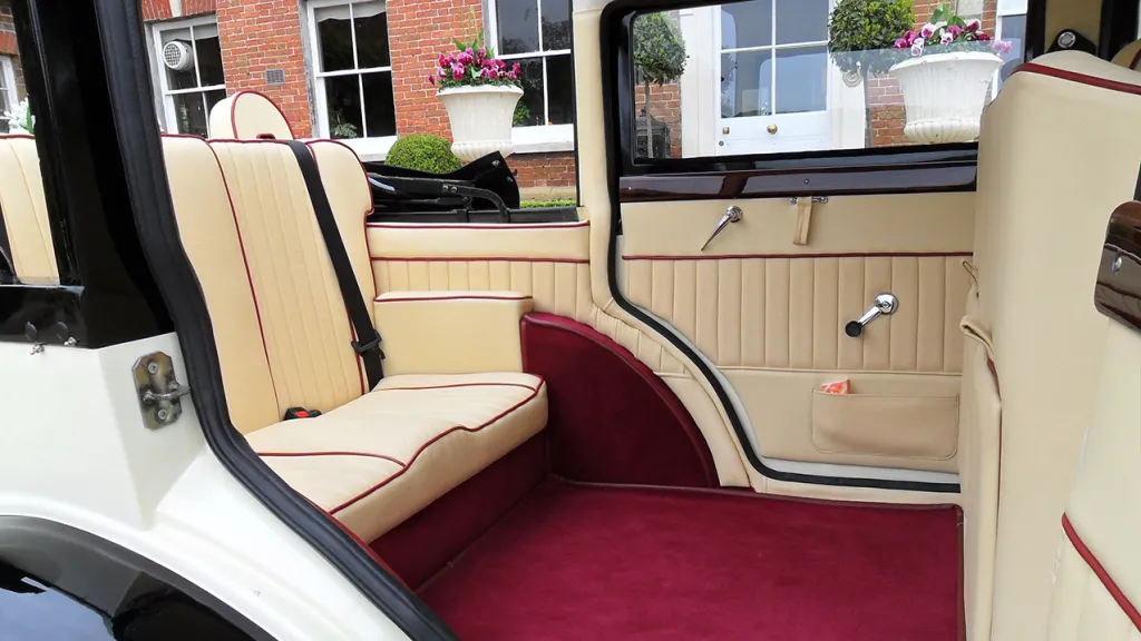 Rear interior with cream leather seats and roof open