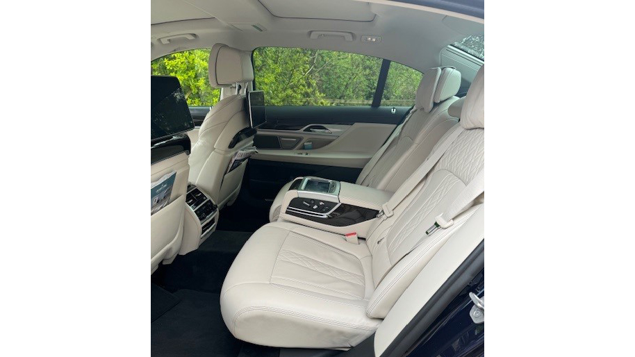 Long Wheelbase rear interior photo with cream leather interior
