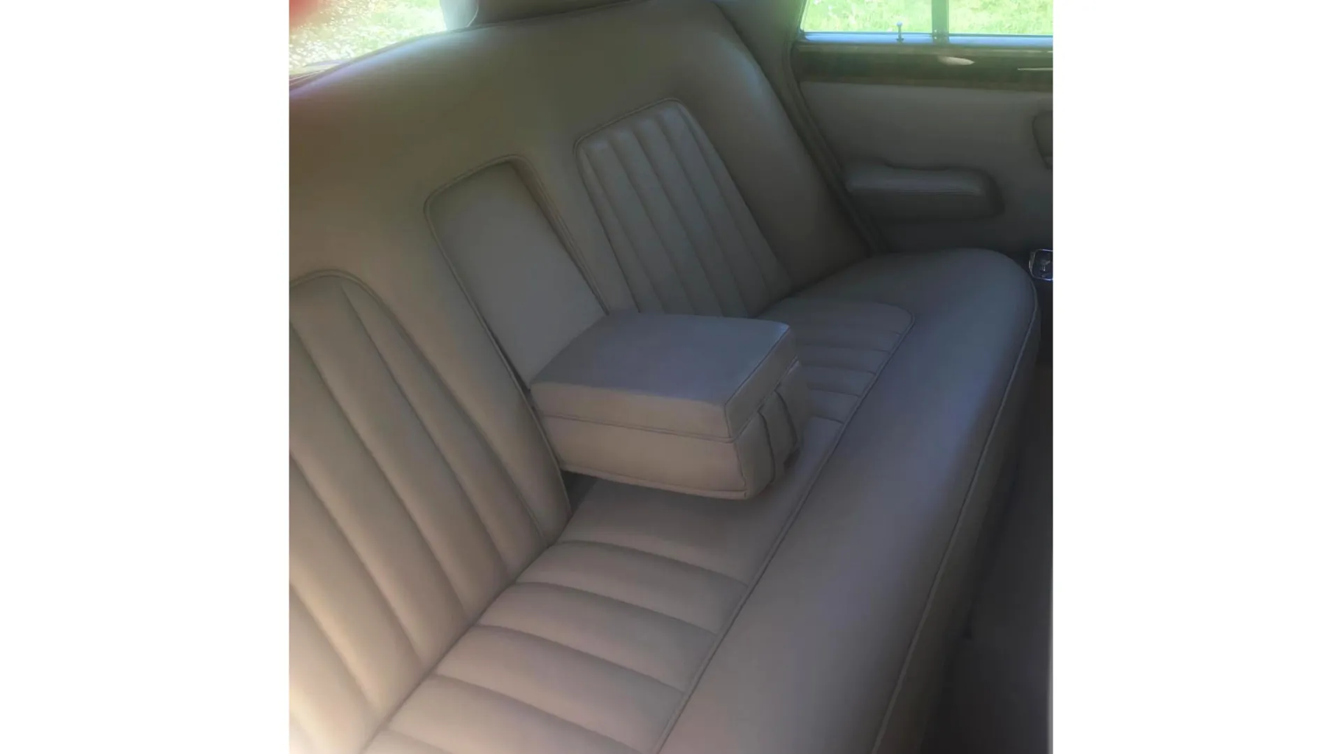 Cream interior rear seats of Rolls-Royce Silver Shadow