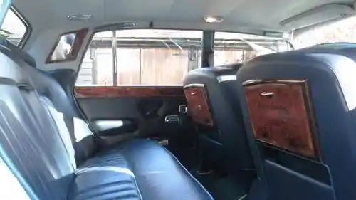 rear interior photo showing blue Leather interior and wooden picnic table