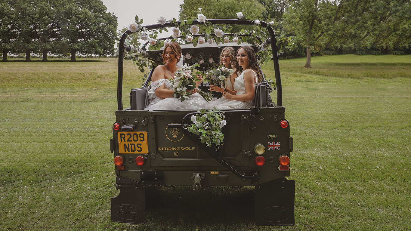Rear View of Military Landrover showing Bridesmaids seating area with the roof open
