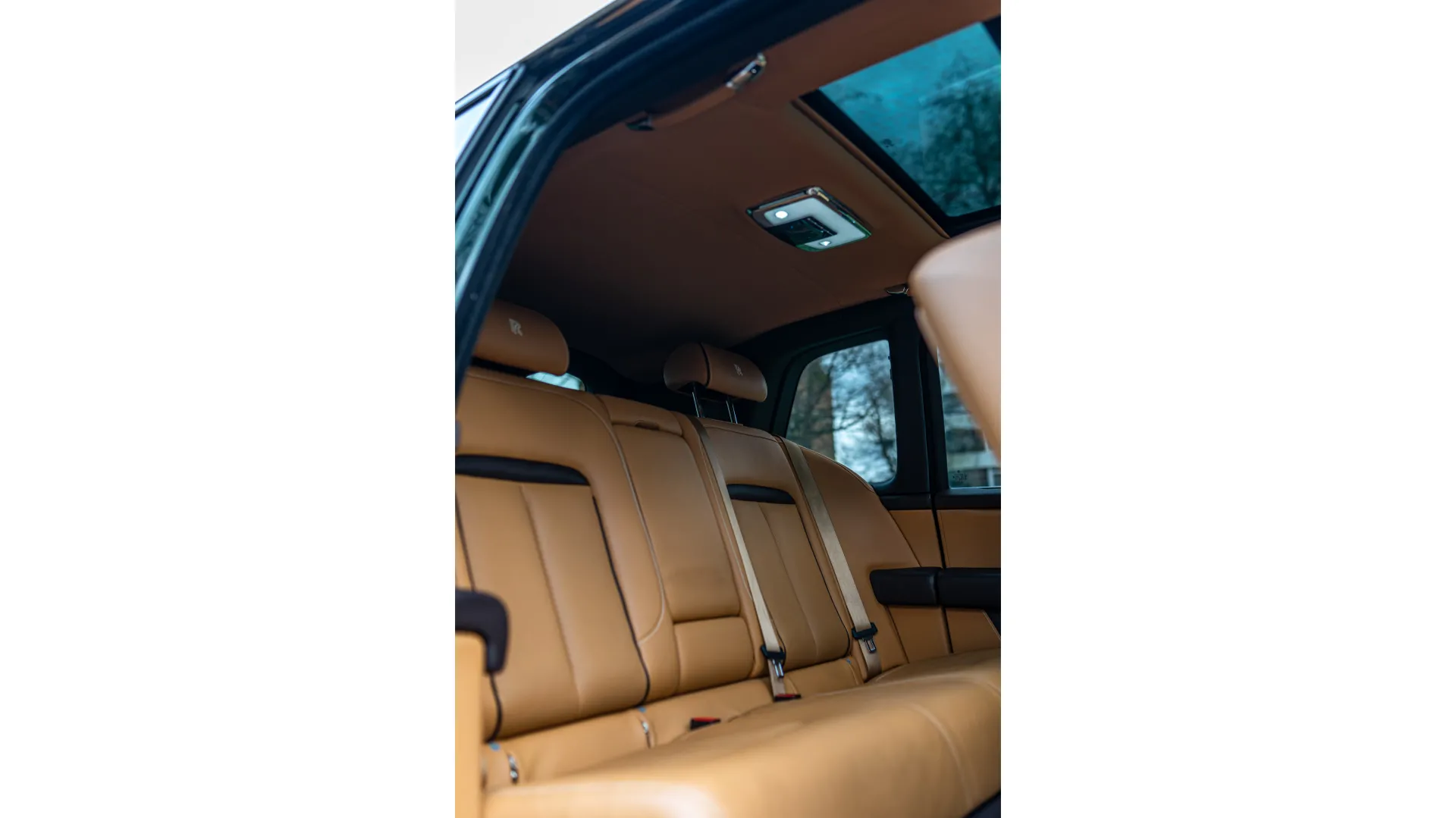 Rear Seats in A Rolls-Royce Cullinan with Tan Leather Interior and sunroof
