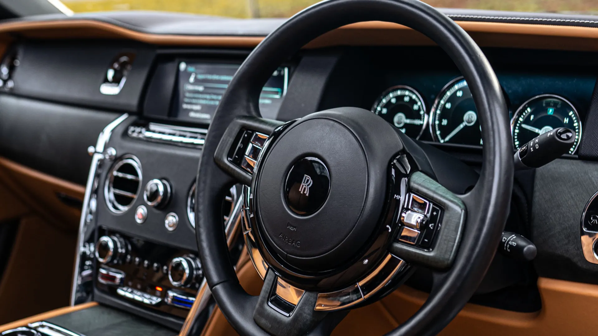 Driver Steering wheel and dashboard in a Rolls-Royce Cullinan