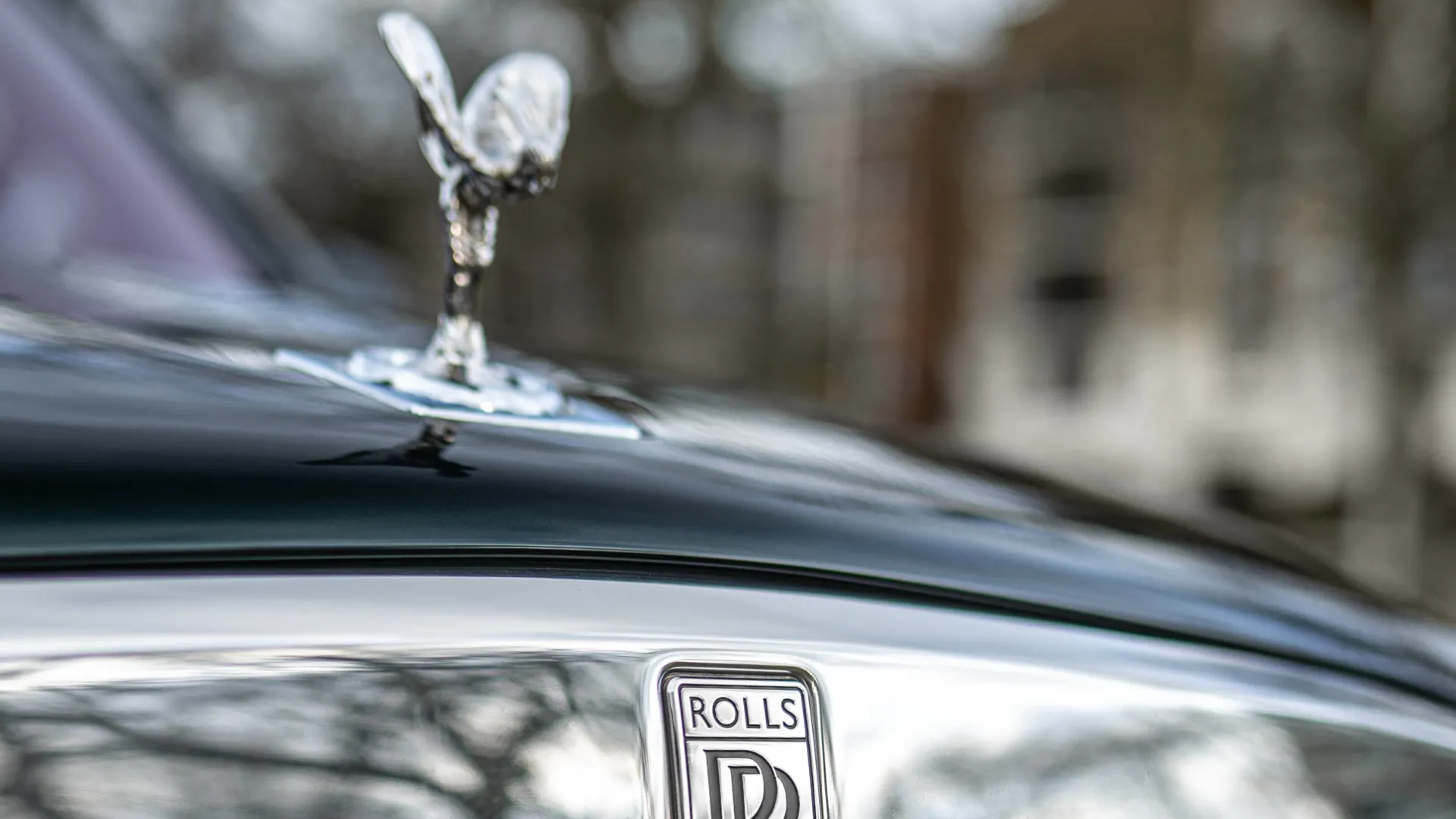 Spirit of Ecstasy on top of the Chrome Rolls-Royce Grill