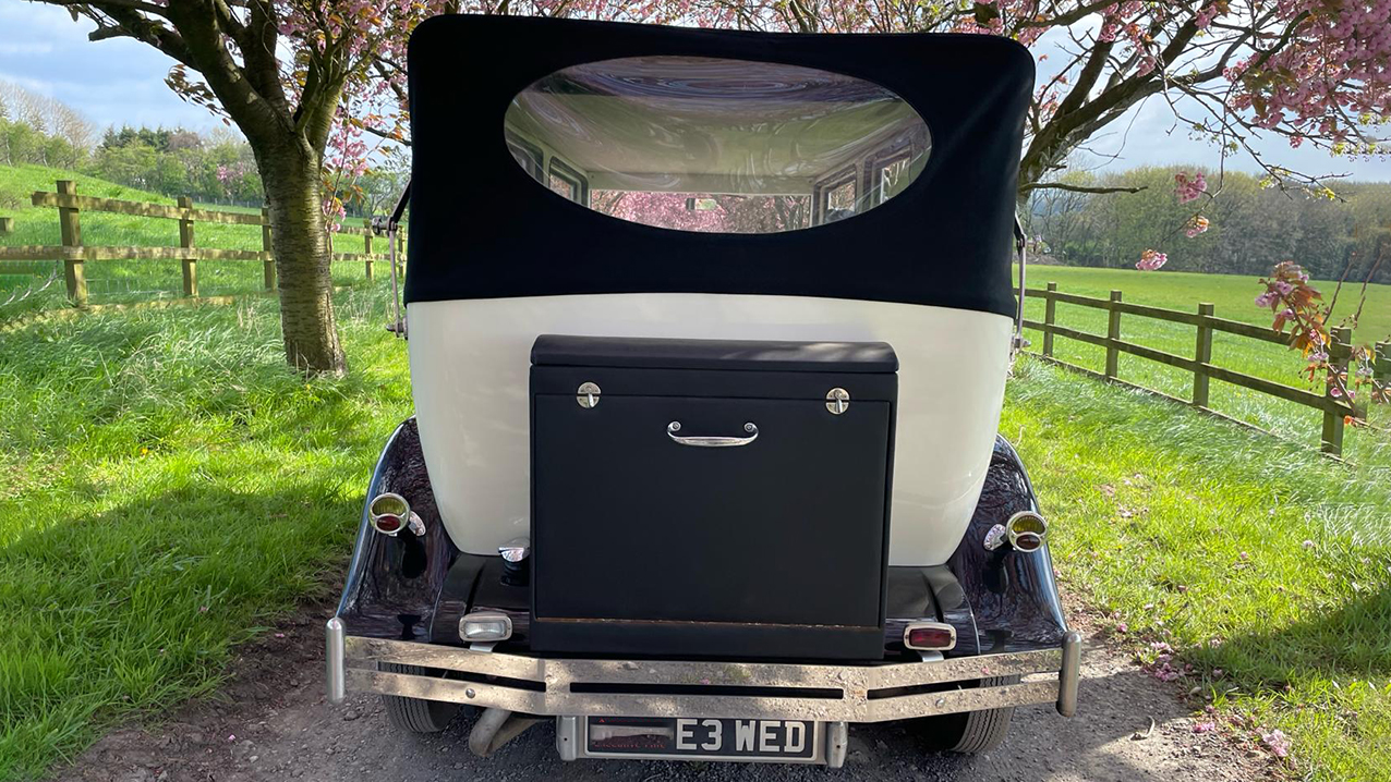 rear view of Bramwith Landaulette with roof closed showing picnic trunk at the rear of the vehicle