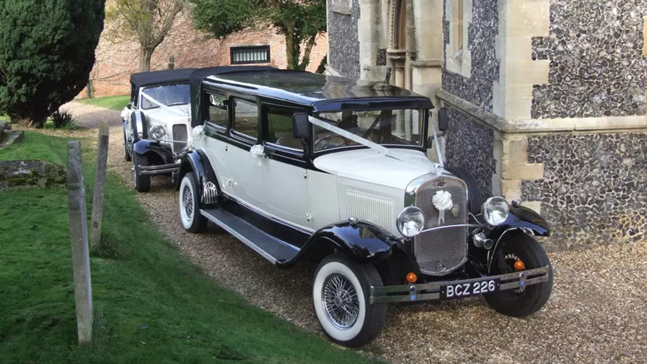 Front Side view of Vintage Bramwith convertible with White Ribbons followed by another identical  Bramwith vintage car