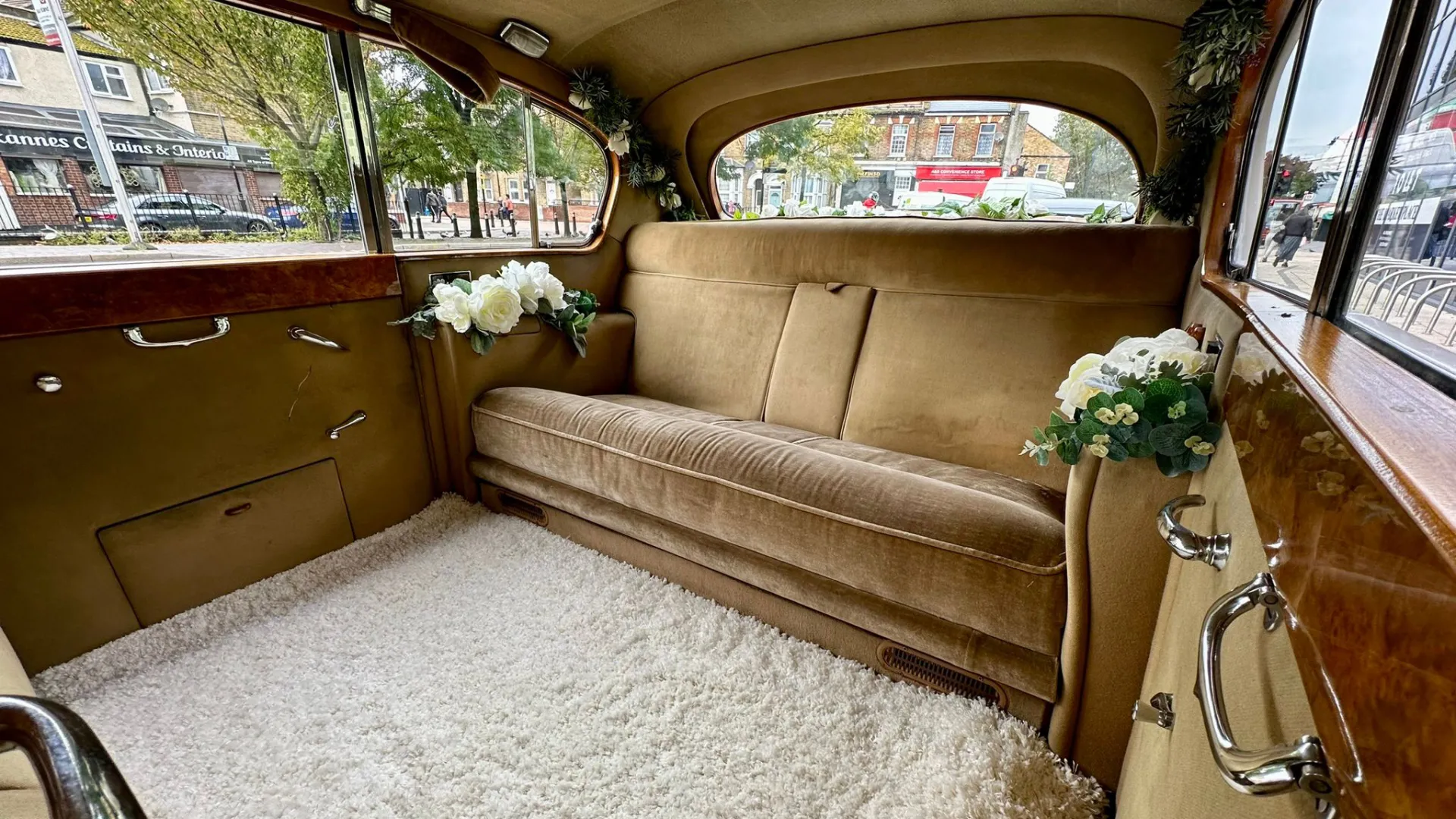 Gold Colour interior of Classic Asutin Princess Limousine with casual seats folded up