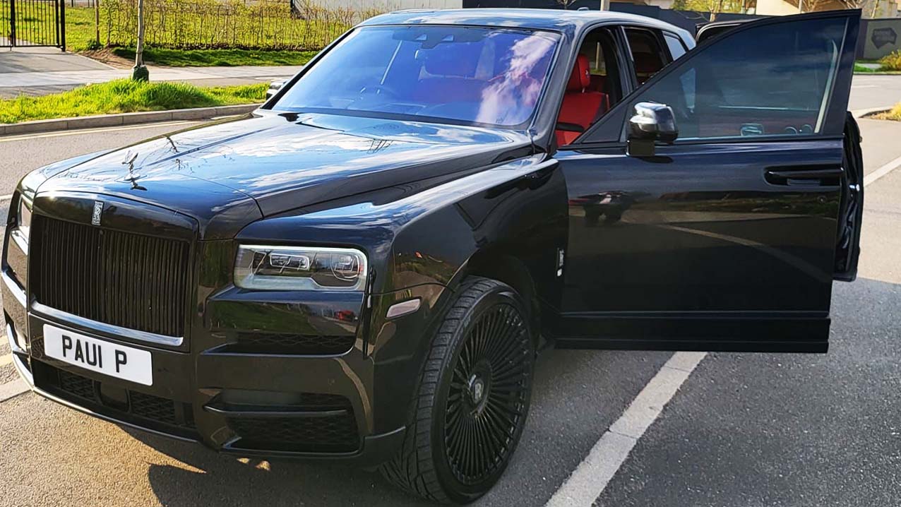 Left Front Side view of Rolls-Royce Cullinan in Black with doors open