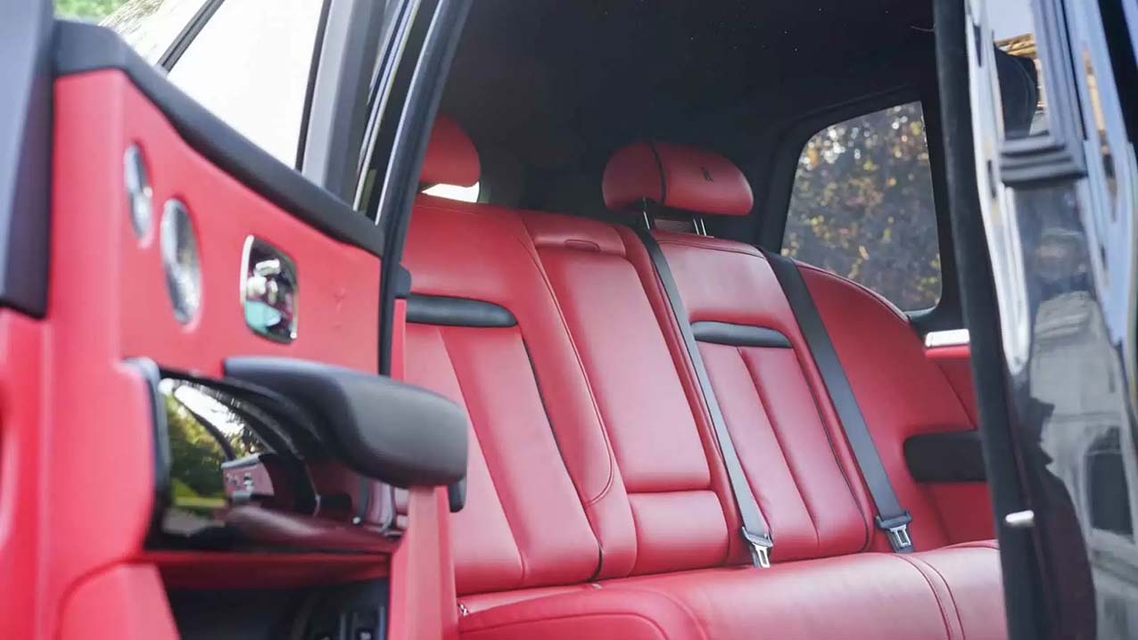 Rear interior of Burgundy Leather interior in A Rolls-Royce Cullinan