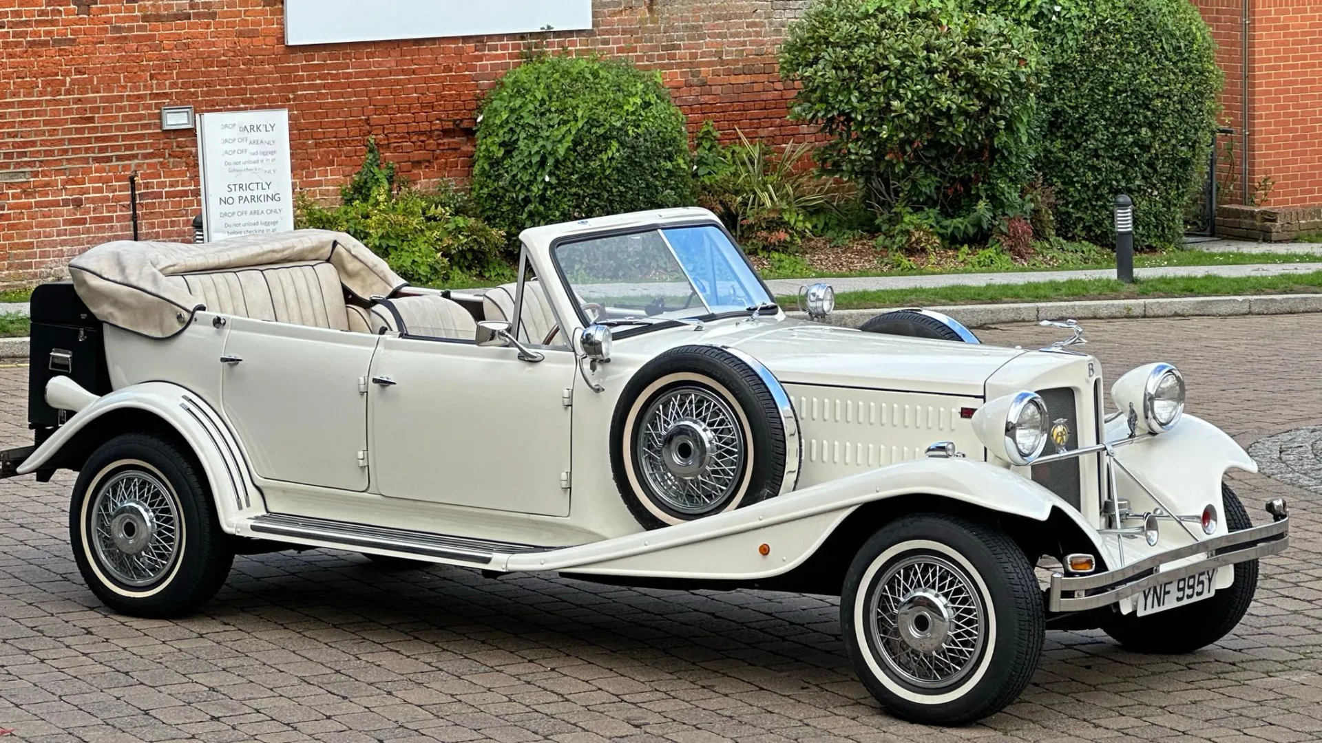 right side of Convertible Beauford with Roof down, spare wheel mounted on the side of the vehicle