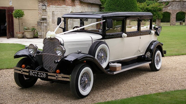 Front Side view of Vintage Bramwith convertible with White Ribbons