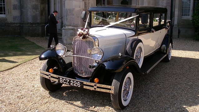 Front Side view of Vintage Bramwith convertible with White Ribbons