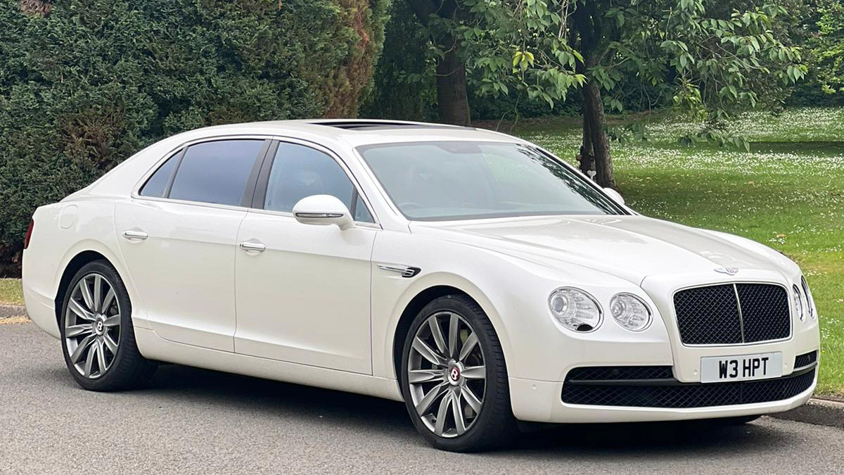 Right Side view of White Bentley