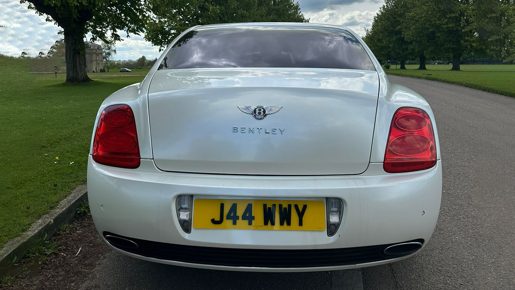 Rear view of White Bentley