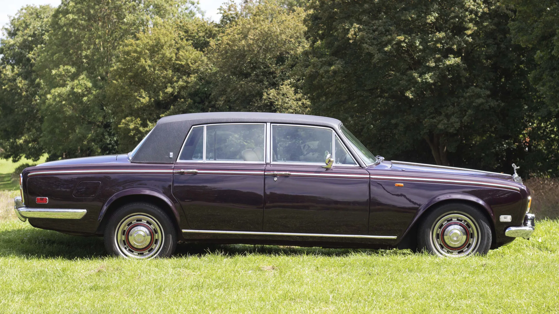 Side view of Classic Rolls-royce silver Shadow in Garnet