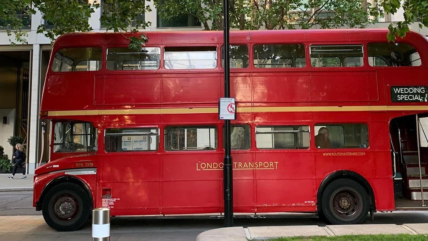 Left side view of Red Routemaster bus in Street of London