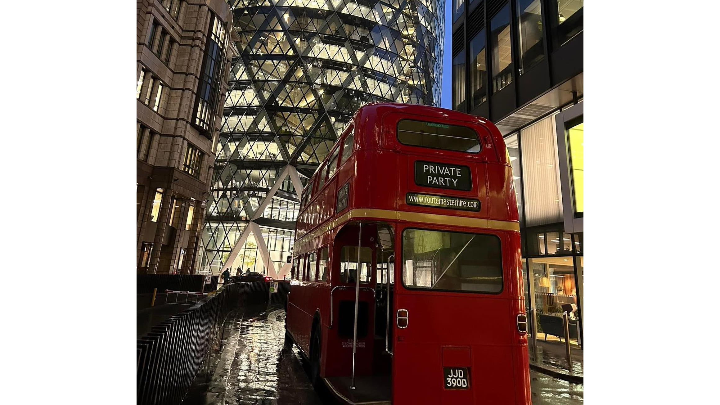 Double Decker Red Routemaster bus by night