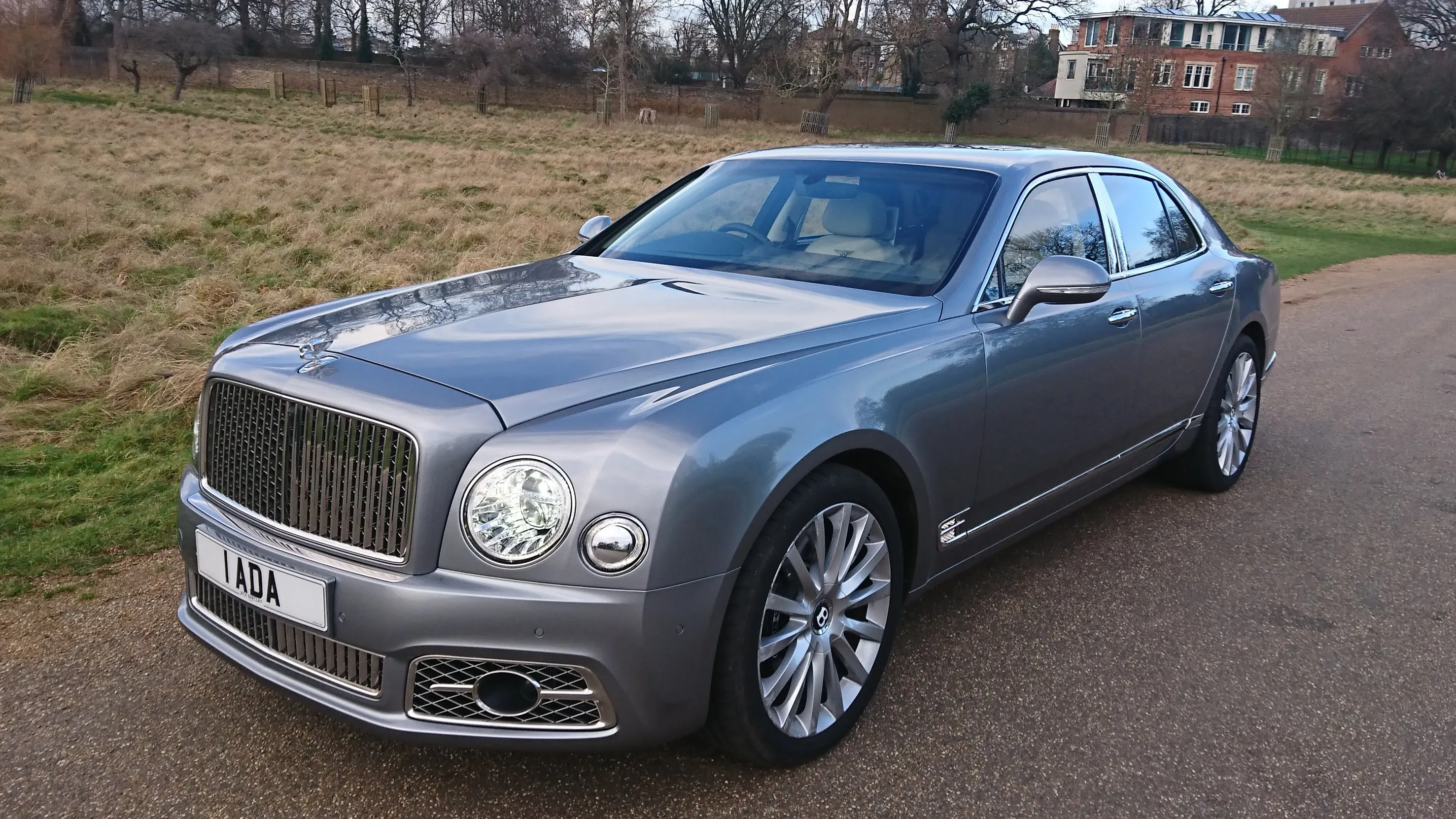 Modern Silver Benltey Mulsanne at a local Egham park in a winter background.