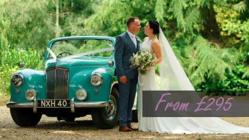 Classic Turquoise Lanchester Cabriolet with Bride and Groom holding each others. Hire price showing at £295 on the photo.