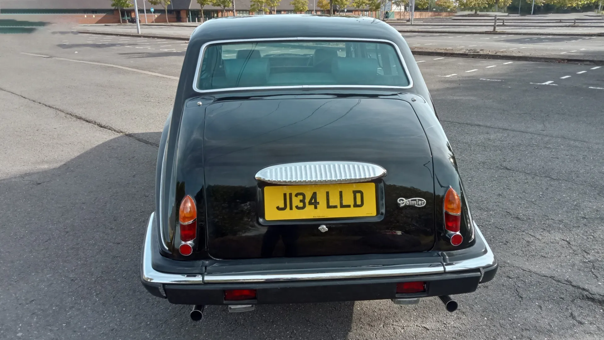 Rear view of Black Daimler Limousine showing the Daimler badge