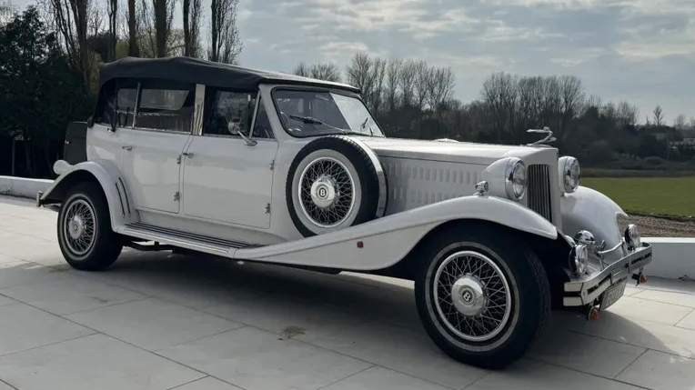 Right side view of BEauford convertible with black soft-top roof close