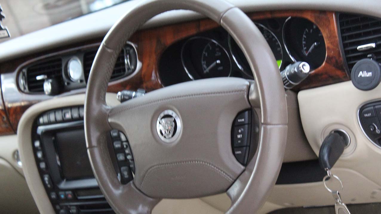 Front interior wooden dashboard and sterring wheel