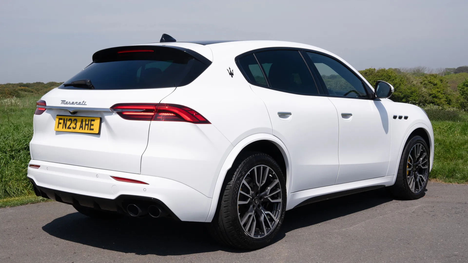 Rear right side view of White Maserati Grecale